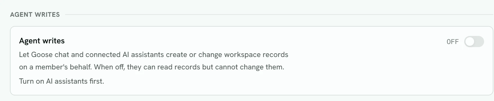 The Agent writes card in Settings, Organization, switched off, with the line Turn on AI assistants first.