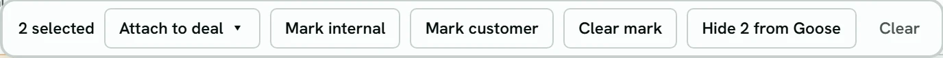 The bar that appears when meetings are selected: 2 selected, with Attach to deal, Mark internal, Mark customer, Clear mark, Hide 2 from Goose and Clear.